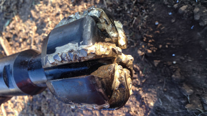 Close-up of a Welltec E-Line milling tool with cutting elements used for efficient ball seat removal during well intervention operations.