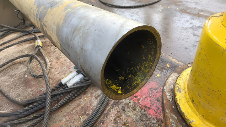 Close-up of a cleanly cut high-strength tubing section after precision cutting with Well Cutter® during a well intervention operation.