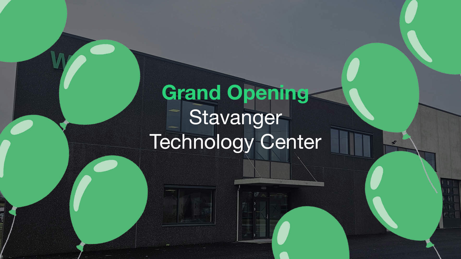 Green balloons surrounding a building celebrating the grand opening of Stavanger Technology Center.