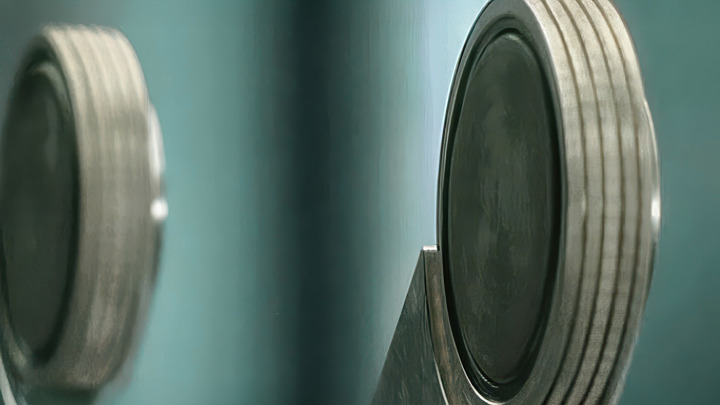 Close-up view of tandem tractor wheels designed for tractoring through a Y-tool in downhole operations.