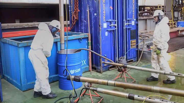 Power Suction Tool (PST) performs E-line barrel test during heavy-duty clean-out operation at surface facility.