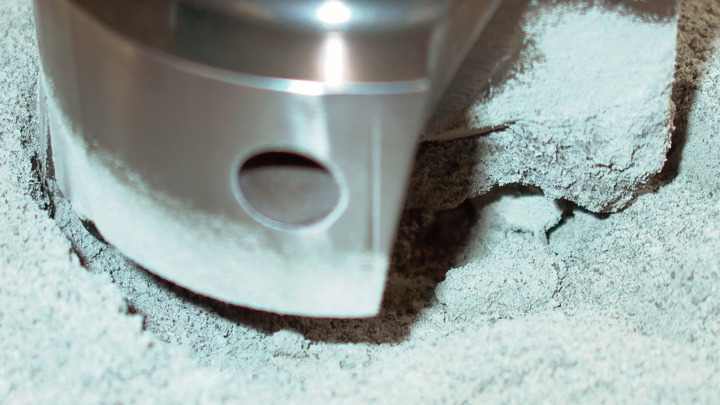 Close-up of a milling tool removing hard scale deposits during riserless subsea scale milling completed in three hours.