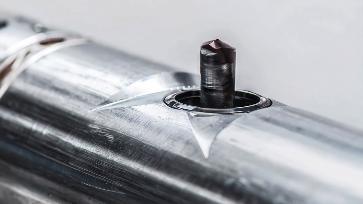 Close-up of the Welltec® Puncher deployed to create 16 holes in one run, showcasing the tool’s precision mechanism in action.